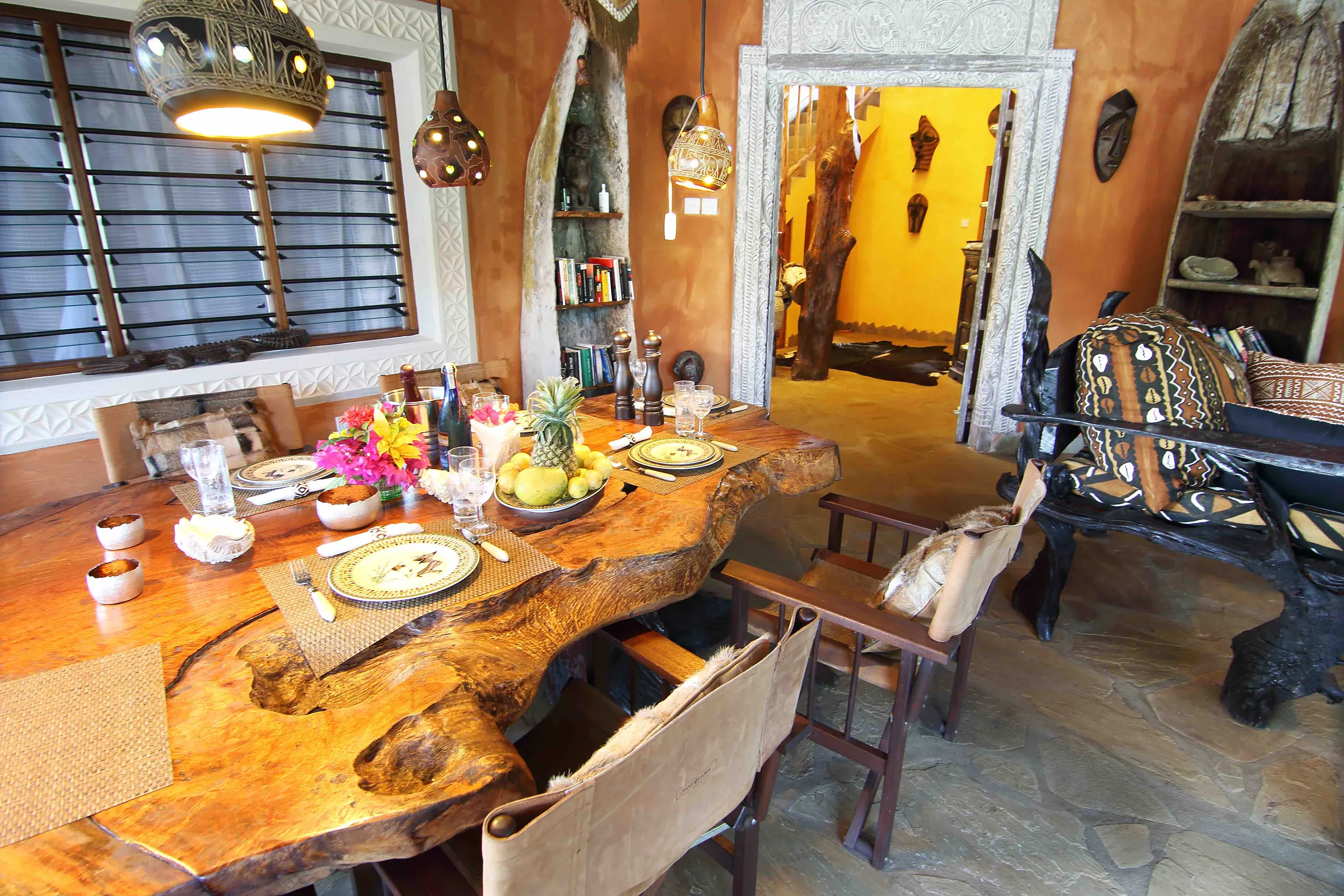 Dining table cut from a single slab, laid for six